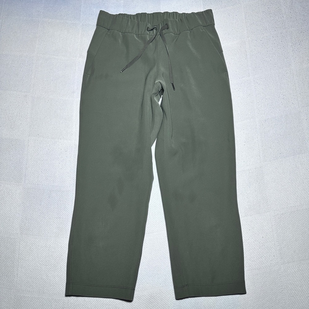 Lululemon On the Fly Crop Pant Womens 6 Woven Straight Leg Dark Olive W6AVMS